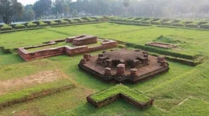Cross-shaped central shrine and monastery walls at Ananda Vihara