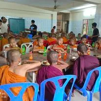 Children and novices eating together in the dining hall