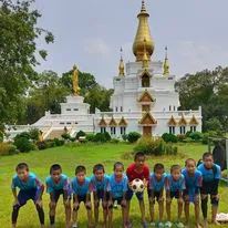 The orphanage football team in front of the World Peace Pagoda