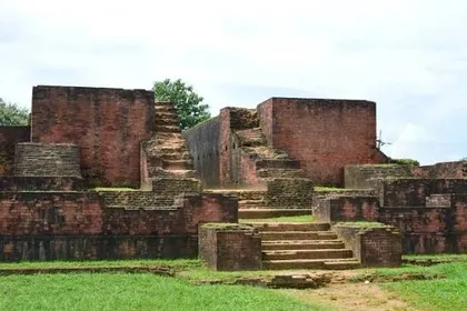 Brick ruins of Itakhola Mura rising in terraces