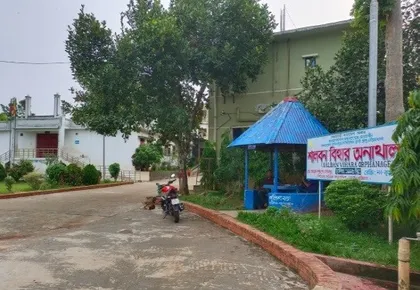 Entrance road and sign of the Salban Vihara Orphanage