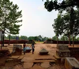 Visitors among the brick remains of Queen Mainamati's palace