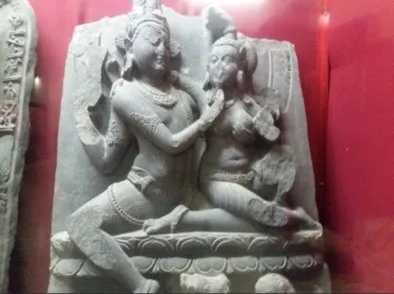 Stone sculpture of a divine couple